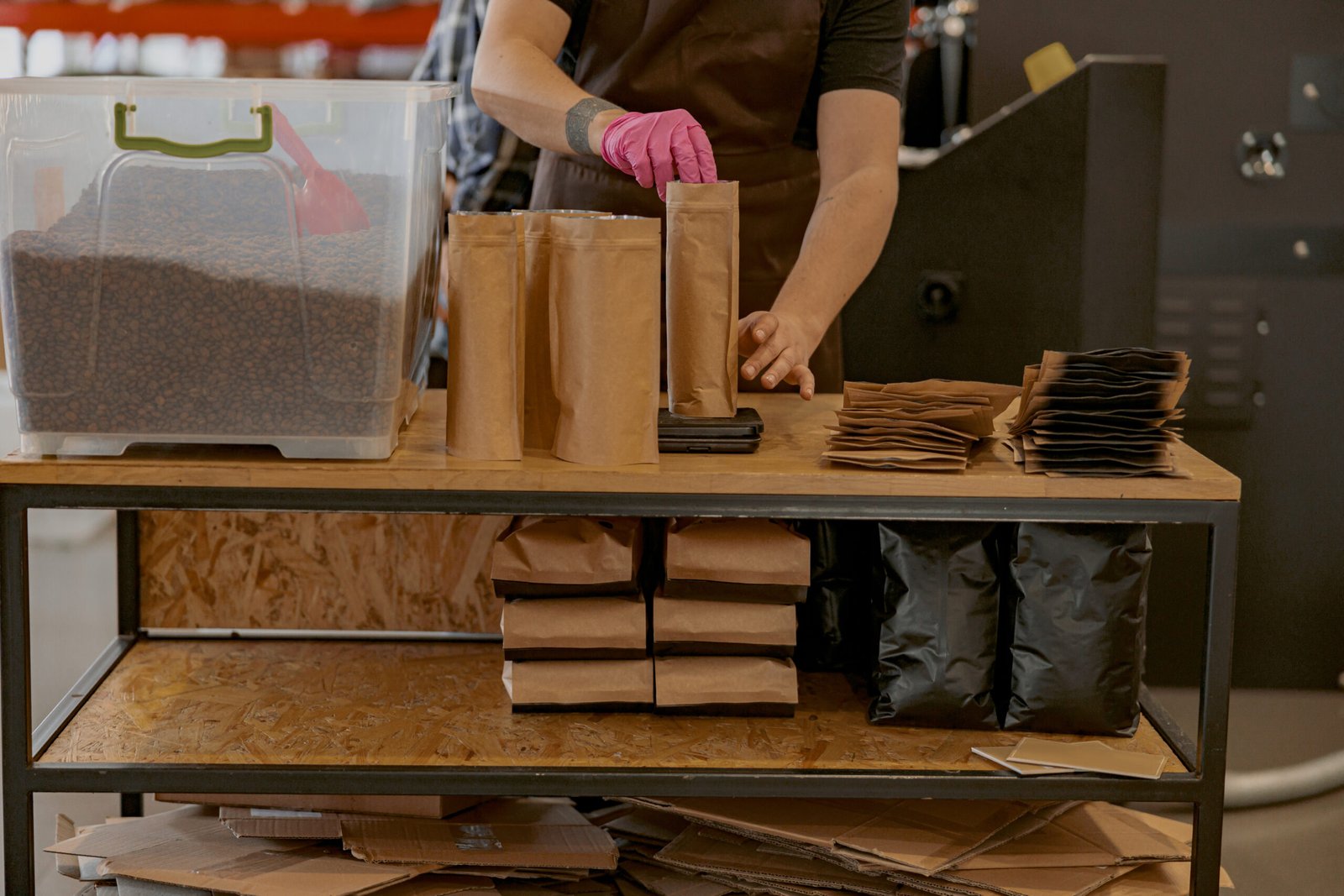 Kraft takeaway packaging stocked on café shelving